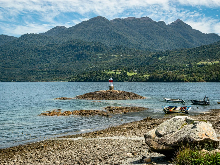 there is a boat that is parked on the shore