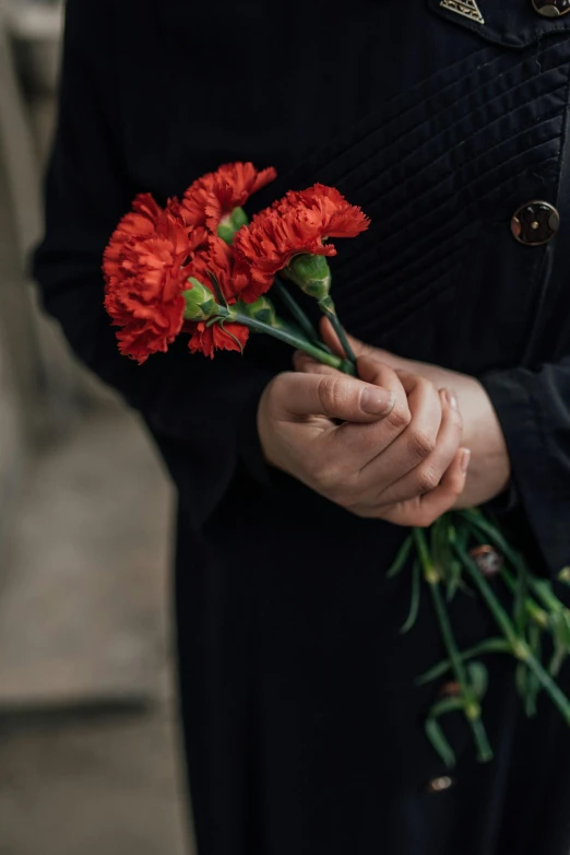 a woman with flowers in her hands