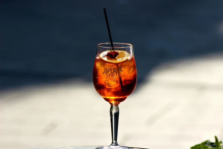 a close up of a beverage in a glass on a table