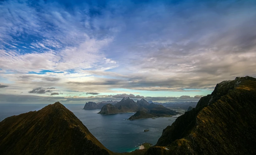 a beautiful view of a large body of water surrounded by mountains