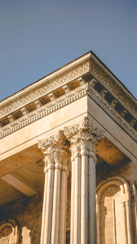 a large stone structure that has two big columns