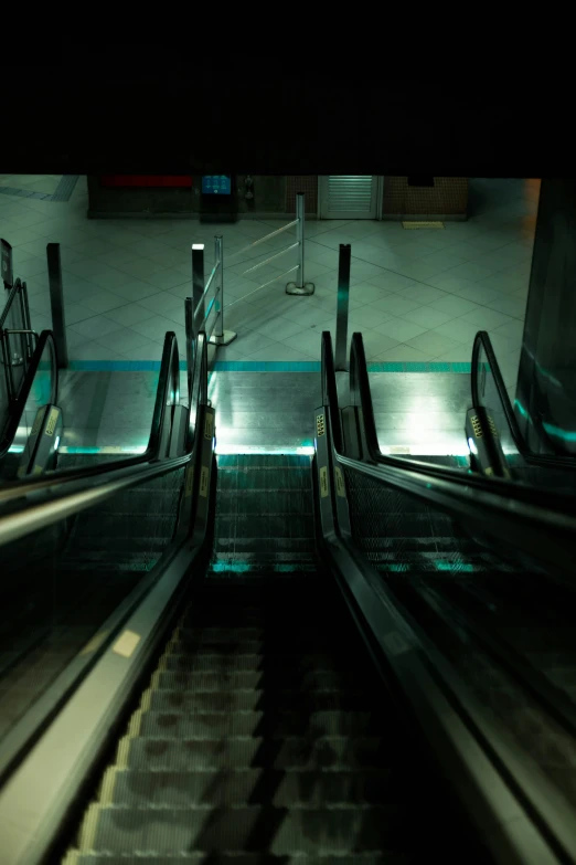 the escalator in the subway is mostly empty