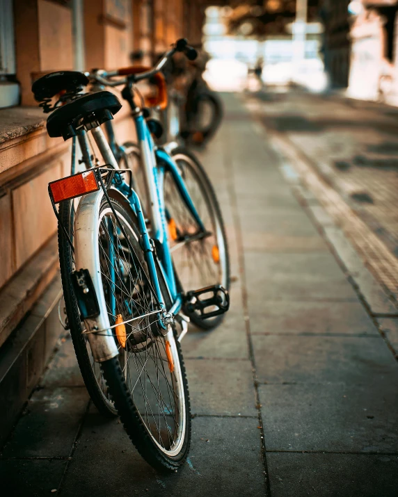 a couple of bikes are parked side by side