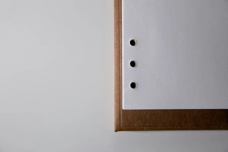 a piece of paper with some holes in it