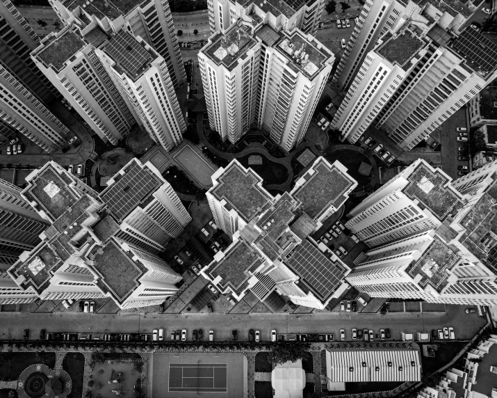 a black and white pograph shows large buildings