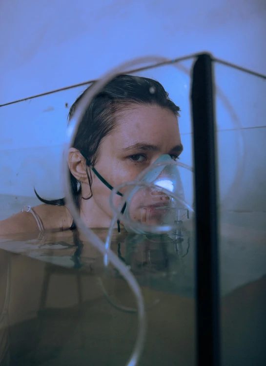 a woman is seen through a magnifying glass