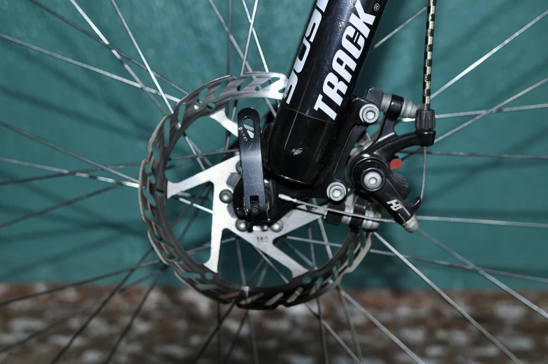 a close up view of the front wheel on a bicycle