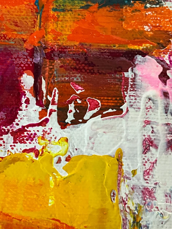 closeup view of an orange and yellow abstract painting