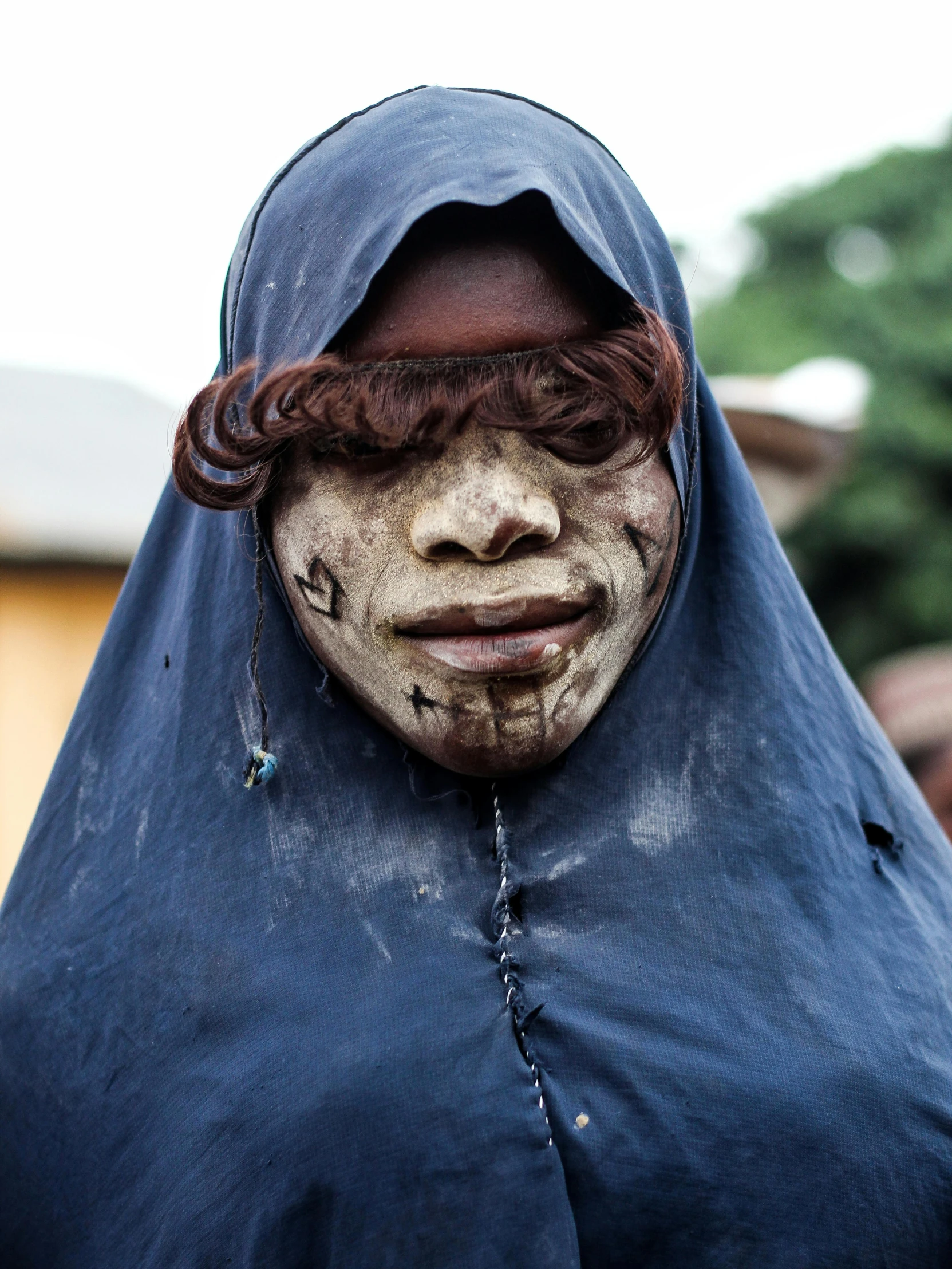 the woman has painted all the same face