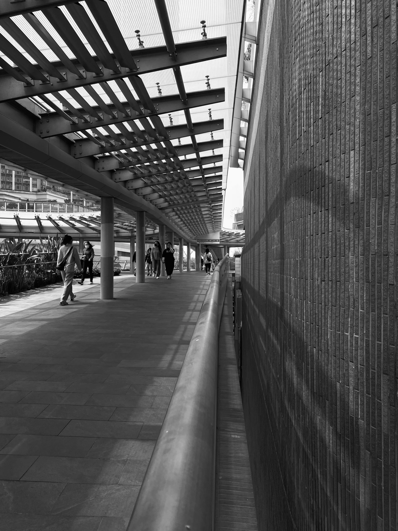 this is a black and white picture of a train station