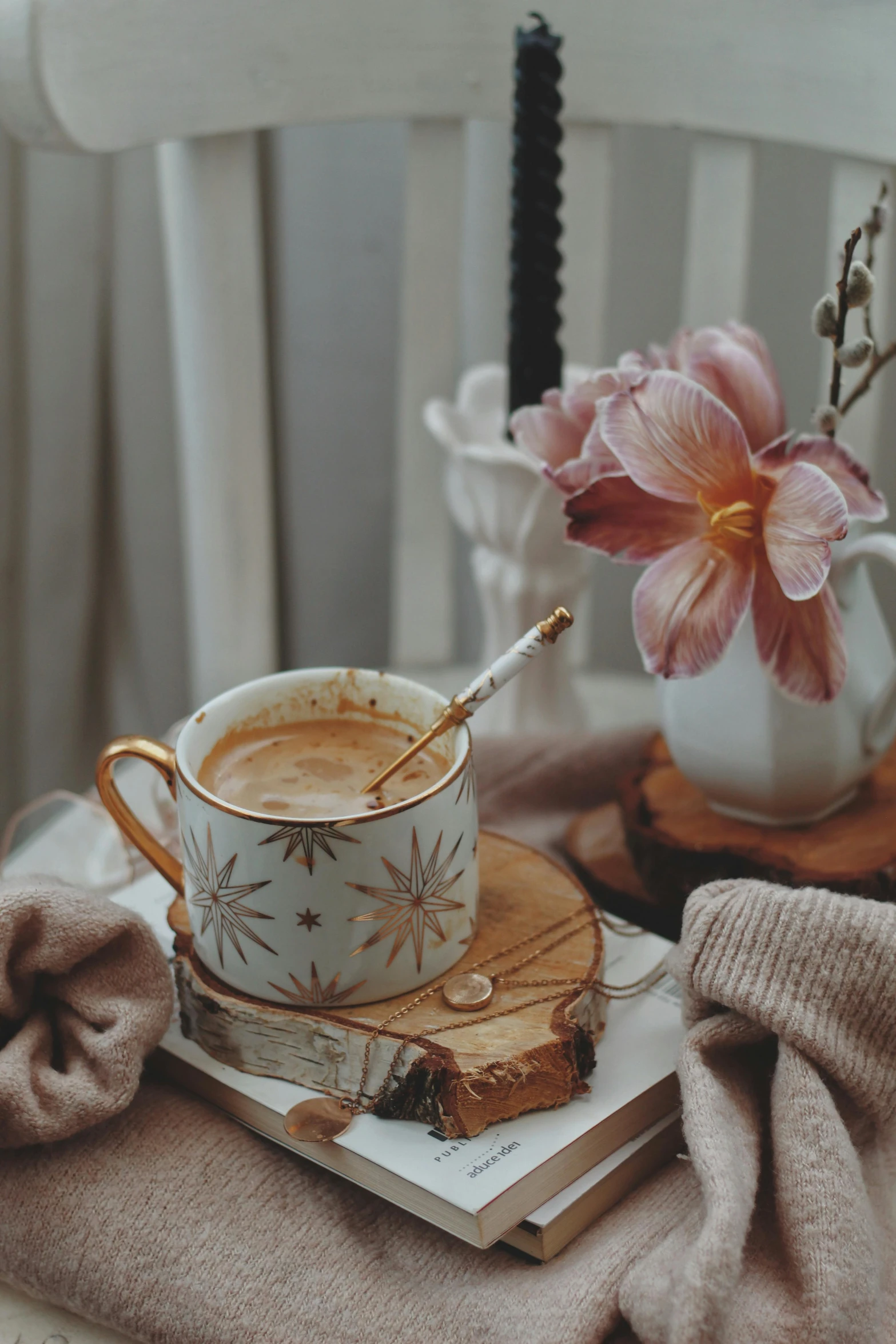 a cup of tea on top of a plate