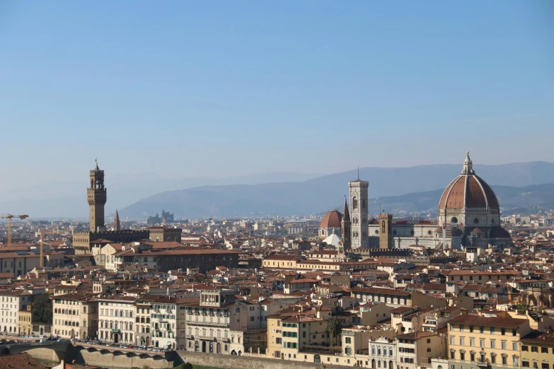 a large city with a bunch of tall buildings and towers