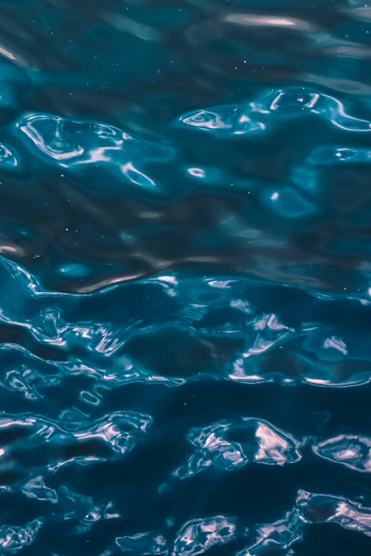 water and clouds reflected in the surface of a lake