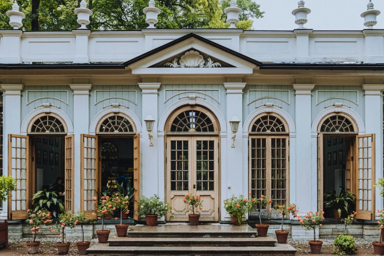 a set of steps leading up to some windows