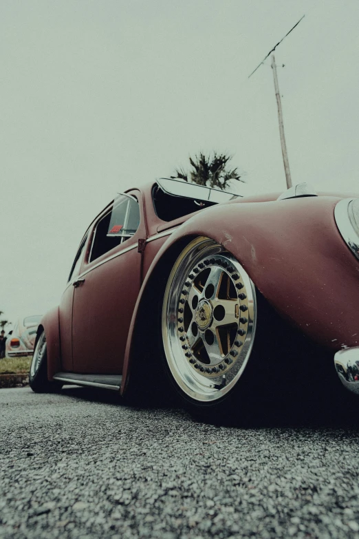 a classic american car parked on a road