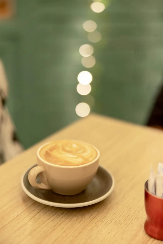 a cappuccino cup of coffee on a saucer