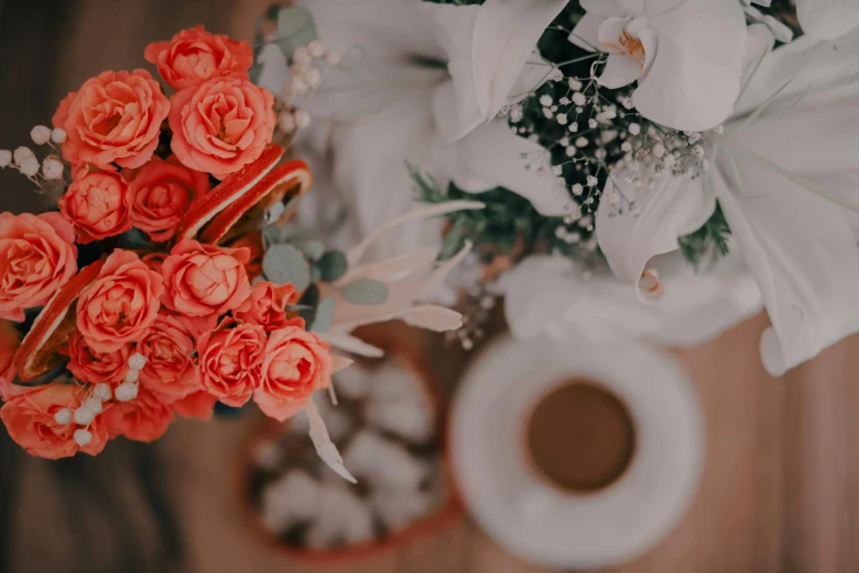 a bouquet of flowers sitting on top of a white table