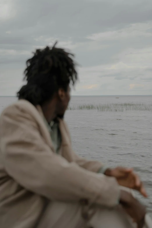 a man that is sitting in a boat