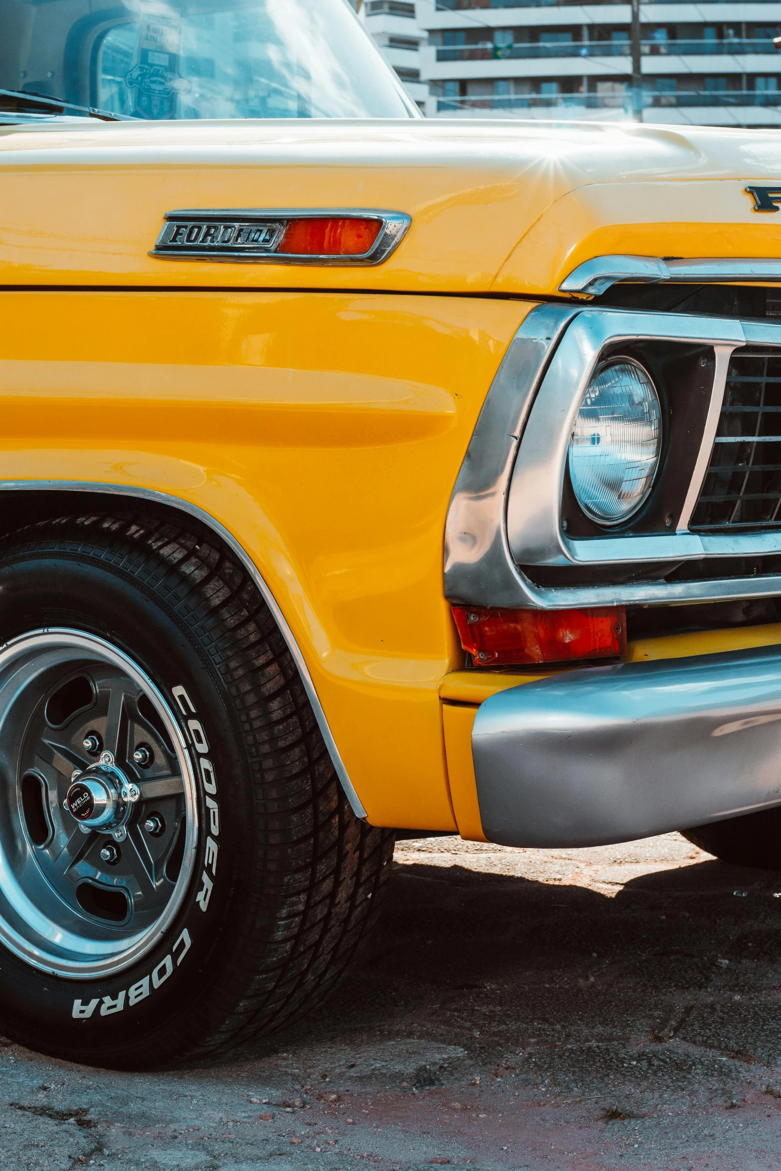 the close up view of an old yellow truck