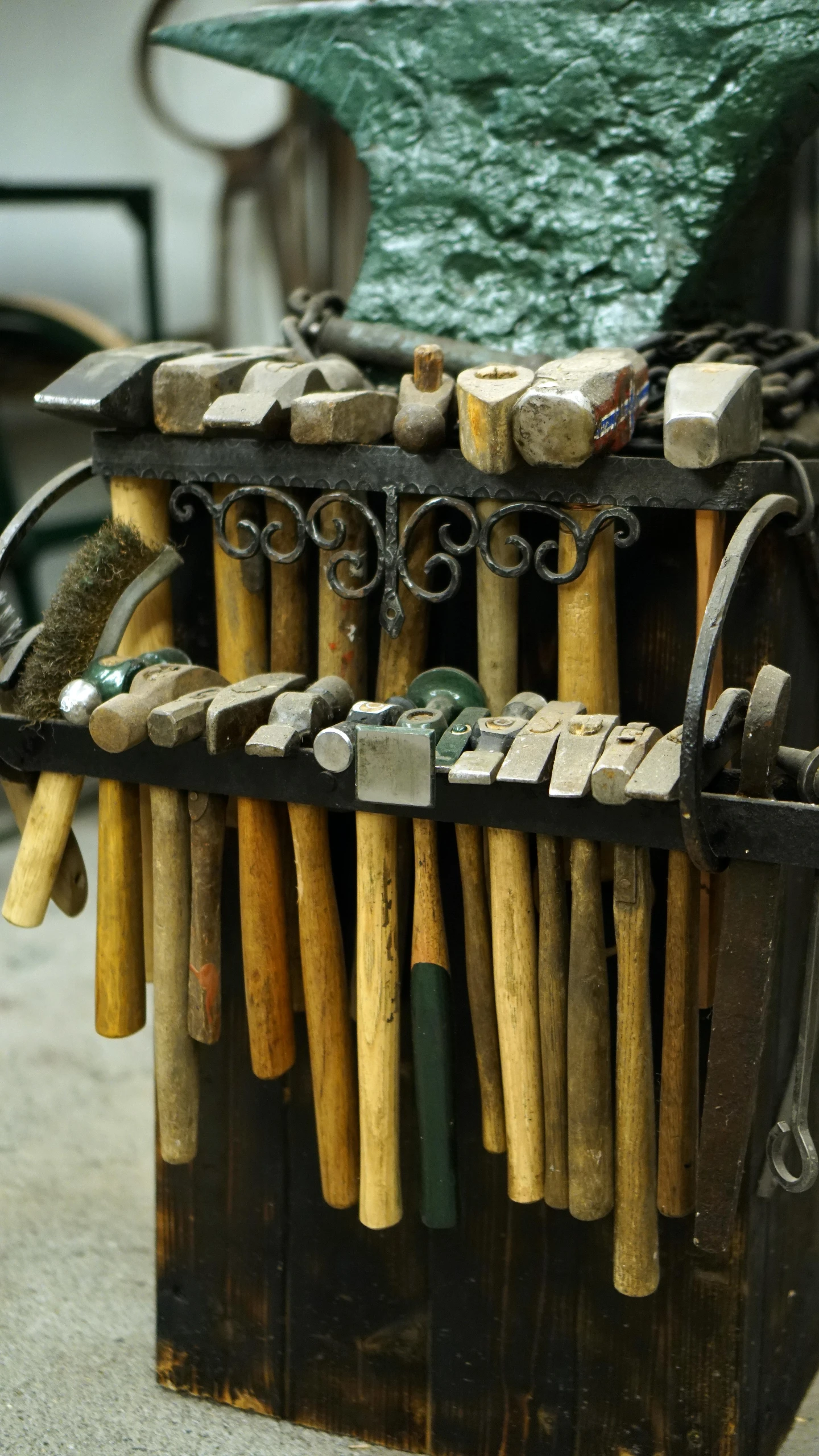 an old piece of wood with a couple of pegs