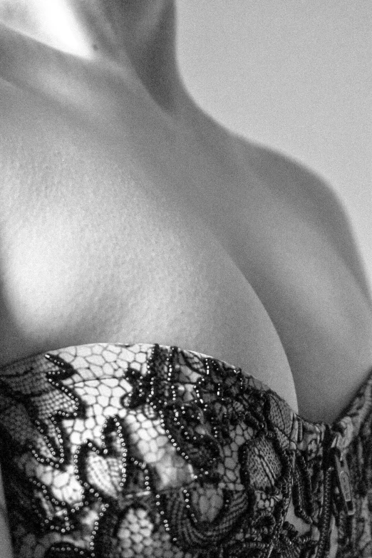 a woman's  covered body, black and white pograph