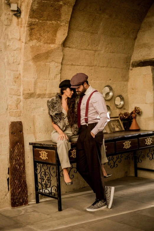 a man and woman sitting next to each other on a bench