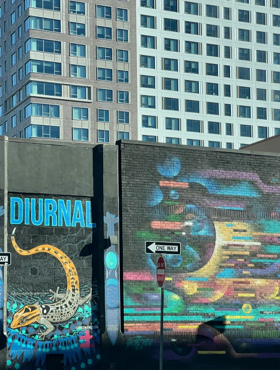 a mural on a wall that reads, journals