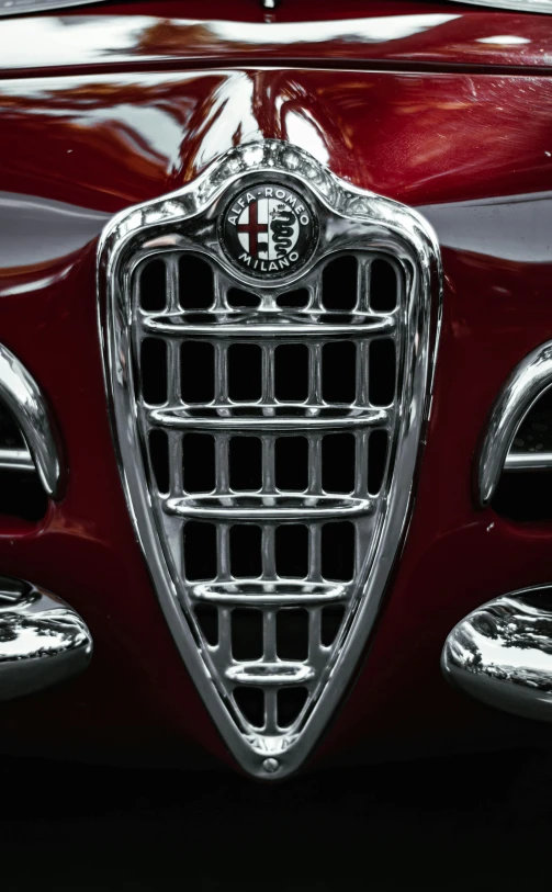 a classic american car grill emblem with chrome finish