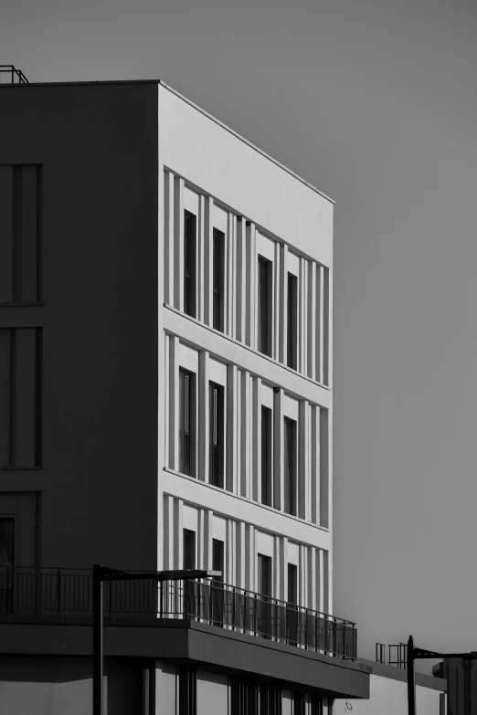 a black and white po shows an apartment building