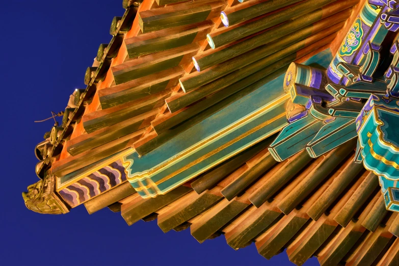 a view of a roof in the daytime with a very unique pattern