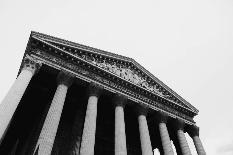 a black and white pograph of an old stone building