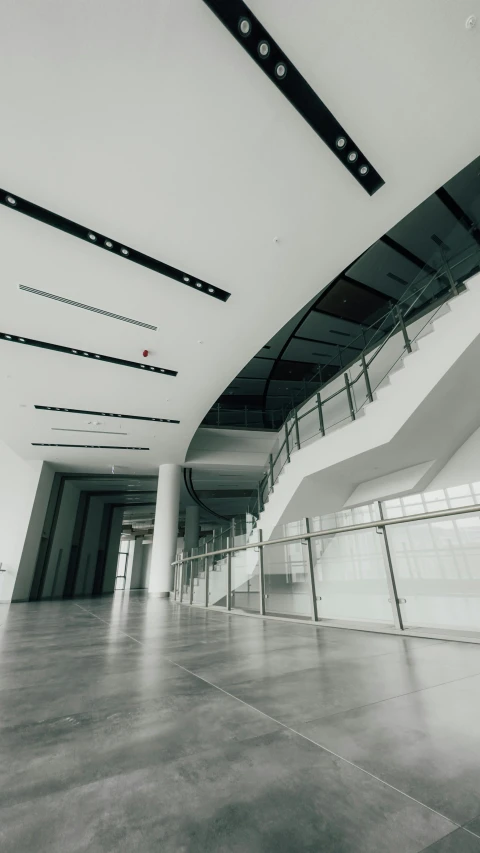 a view inside the large building, looking toward the ceiling