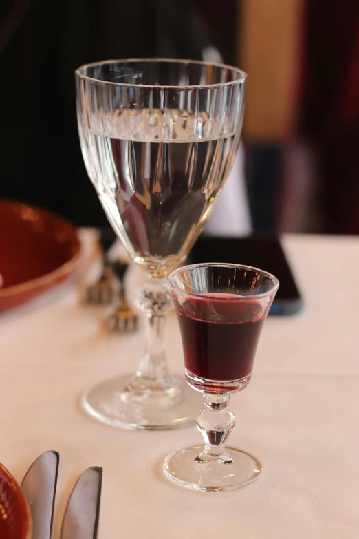 a couple of glasses that are sitting on a table