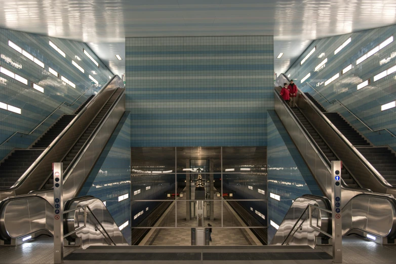 an escalator inside a public transit station