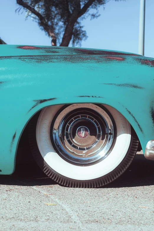 a close up po of a shiny green car