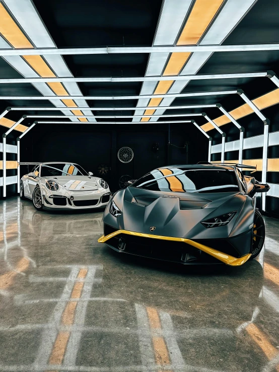 some very pretty cars in a big building