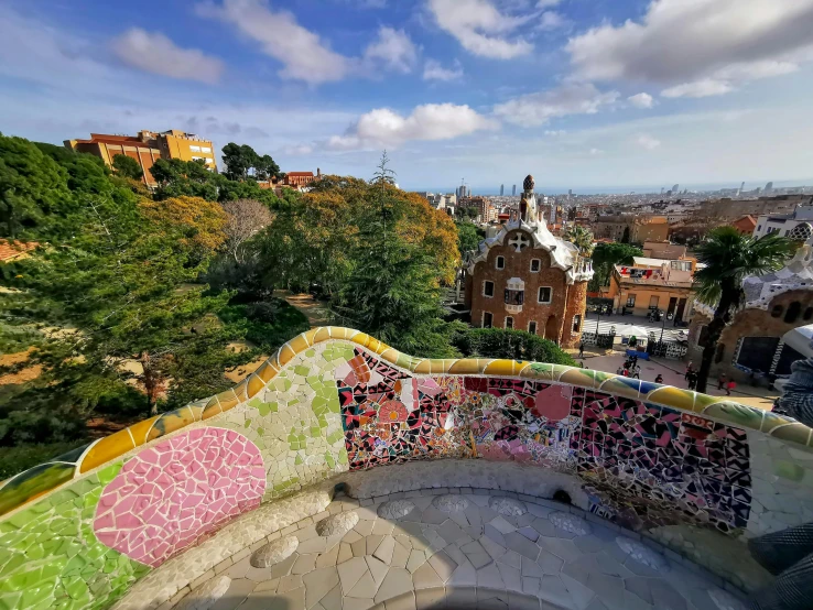 there is a curved bench on the top of a hill