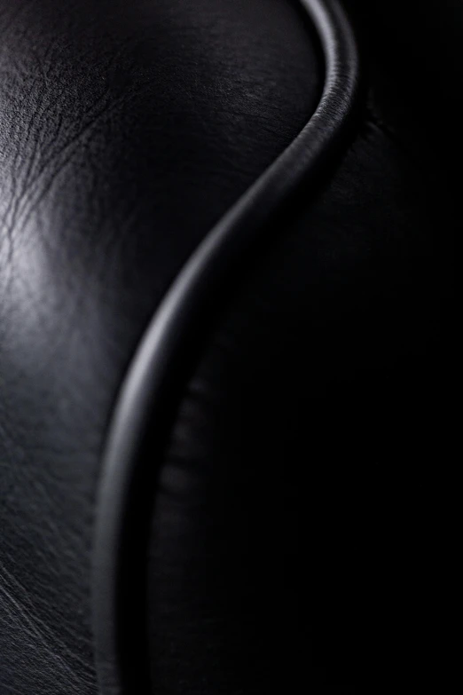 the black upholstered upholster on an artistically designed object