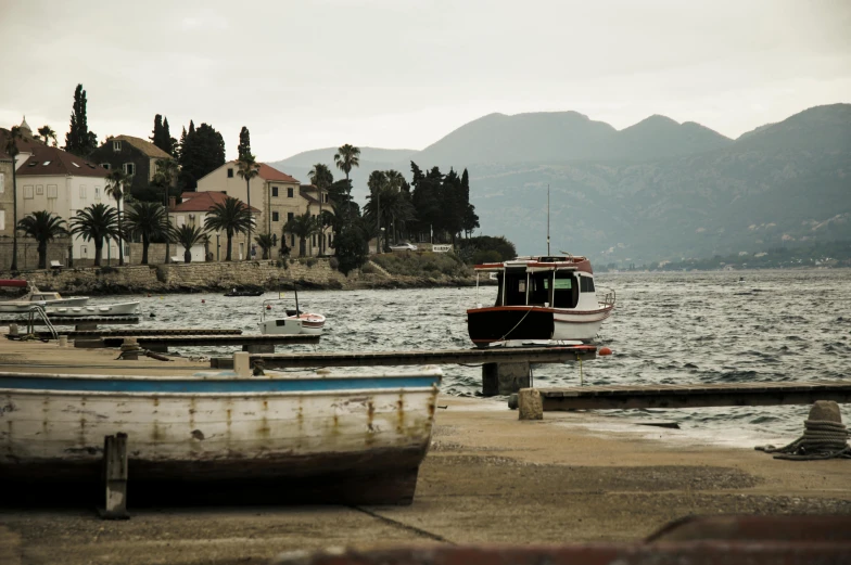 a view of several boats on the shore