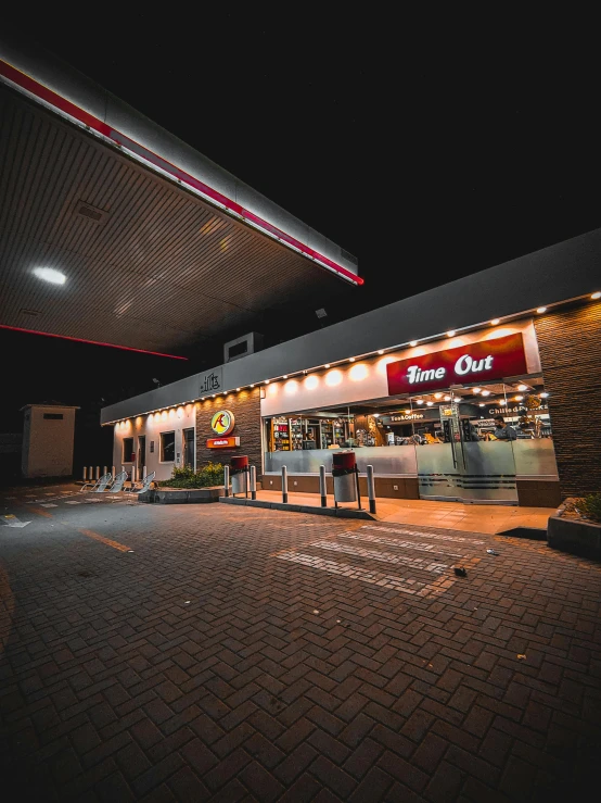 a food store is lit up at night