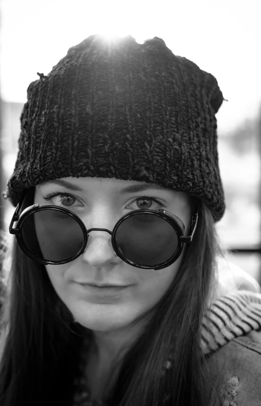 a close up of a person wearing a beanie