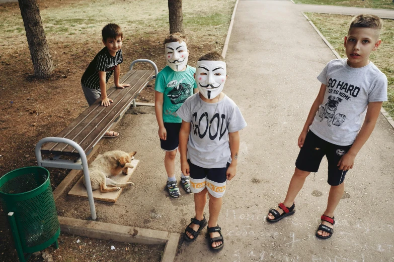 three children wearing their face paint on