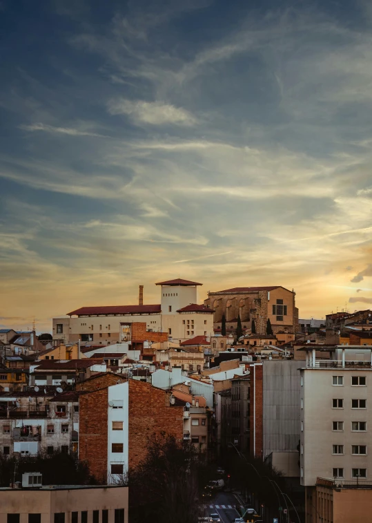 there is a city with buildings and cars