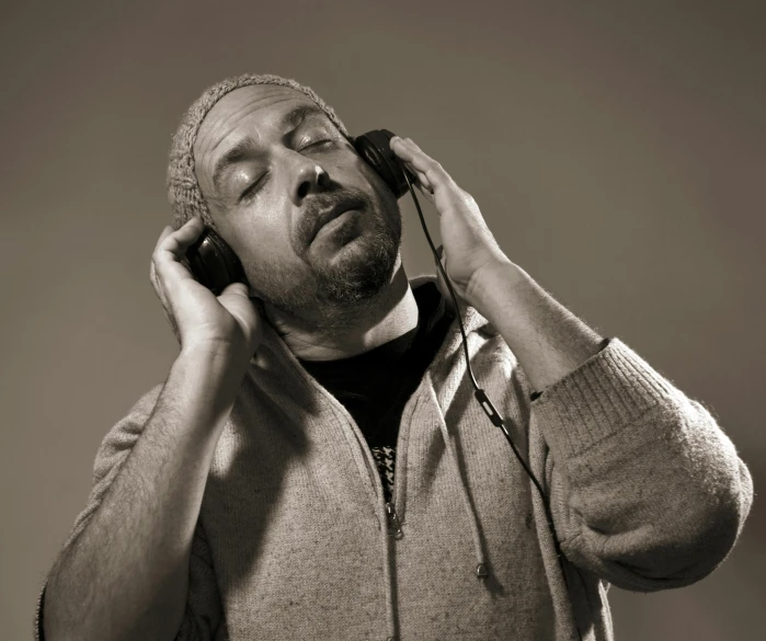 a man with headphones listening to music