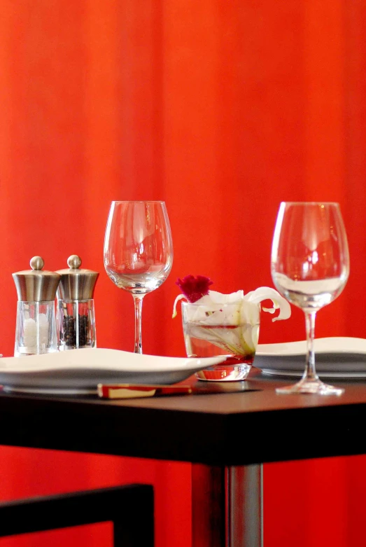 an empty plate on a table in a restaurant