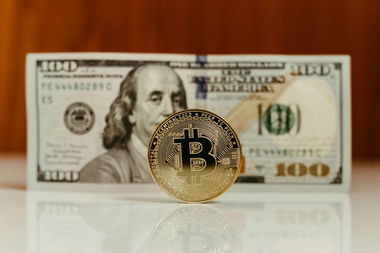 a bit coin is shown sitting on a table