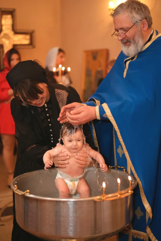 a baptism is being performed at a church