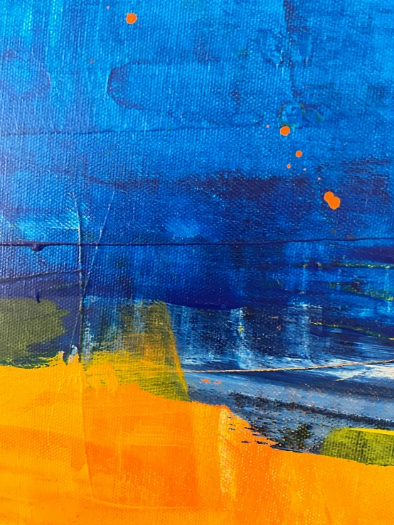 an abstract painting with bright blue, yellow and orange colors