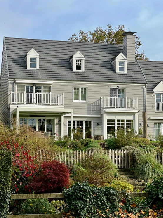 the front view of an empty house on a cloudy day