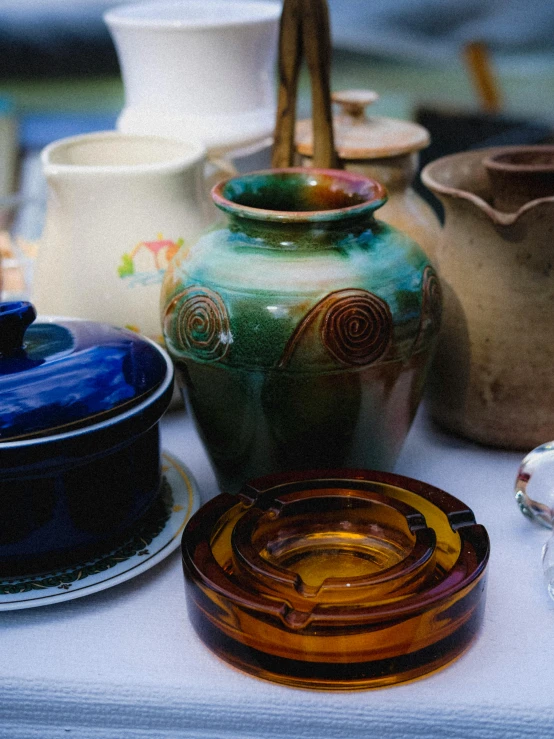 some very pretty blue and yellow ceramic containers